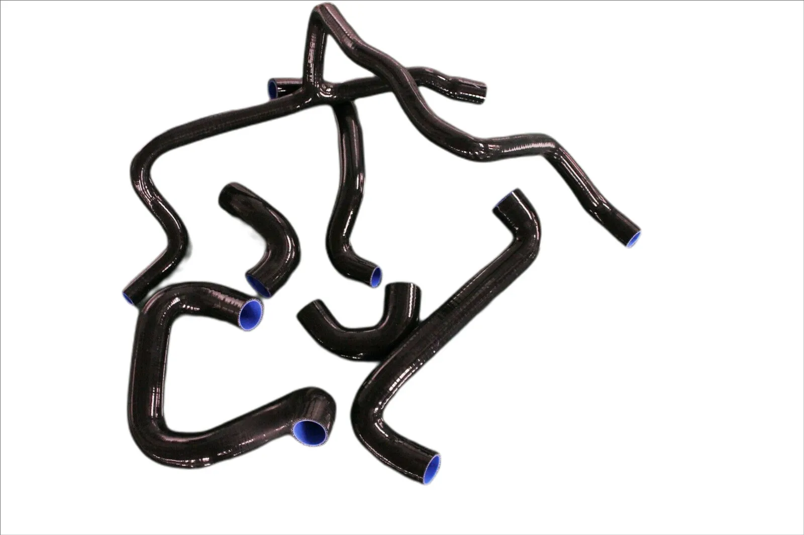 Product Information We supply PREMIUM QUALITY all aluminum radiator and silicone hose kit, oil cooler, intercooler and kit for racing auto and motocross auto bike. We promise that all our products are made of the best materials and advanced manufacture technique. All our products are 100% fully tested to ensure top quality. All manufactured in a brand new state of the art facility with the same manufacturing process that OEM companies use. You are bidding on a Brand New racing SILICONE Radiator & Heater Hose Kit BMW E30 M20 320i/325i 1989-1992. 6 piece kit designed to handle demanding heat cycles, and high heat applications such as turbo charged. Long lasting durable, high grade, thick 4 ply silicone tubing. Condition Premium Quality. 100% quality assurance tested Brand New. Never used or factory buy outs. All Genuine. Our Photos are the actual photos of the products you are buying. We never copy from another company’s catalog or website. Fast shipping. Low Price Guarantee - We Price Match!!! (Certain Restrictions May Apply) Specifications High quality reinforced silicone material Smooth wipe down finish Working temperature: -60 ~ 260 degrees Working Pressure: 0.3 to 0.9Mpa Bursting Pressure: 2Mpa Thickness: 2mm to 5mm, 3-4 mesh Polyester or Nomex layers Size tolerance: +/-0.5mm Resistance to UV, water, ozone and oxygen Included: 2 radiator hose and 4 heater hoses Color option:BLUE/BLACK Vehicle Fits BMW E30 M20 320i/325i with A/C 1989-1992 Payment Options Payment should be made within 3 days. PayPal (please verify your paypal account). Terms of Condition ·International Buyers – Please Note: ·Import duties, taxes and charges are not included in the item price or shipping charges. These charges are the buyer’s responsibility. ·Please check with your country’s customs office to determine what these additional costs will be prior to bidding/buying. · No pickup, online shopping only. · we are manufacturer , all shop order, bulk order ,wholesale is welcome. We also make-to-order. Please feel free to ask. Shipping & Handling · Online shopping only. · The ETA of economy shipping is 10-22 working days, i.e. 2 weeks to one month. · The ETA of standard shipping is 5-10 working days, i.e. 1-2 weeks. · The ETA of expedited shipping is 3-5 working days,. i.e. within one week. Return ·You can return your item within 14 days if the item you receive is not as described ·All items considered for exchange or refund must be returned in "as new" condition, complete with all packaging materials, otherwise the item will be considered used item and may be considered for trade-in purposes only. ·Buyer is responsible for the shipping cost of return postage. Shipping and insurance costs will not be refunded. We will arrange for a replacement to be sent as soon as the item is received by us. ·Items found not to be defective will be returned at buyer's expense. We’re sorry but there will be no returns accepted due to changing your mind. Warranty ·1 Year Warranty Against Manufacturing Defect!